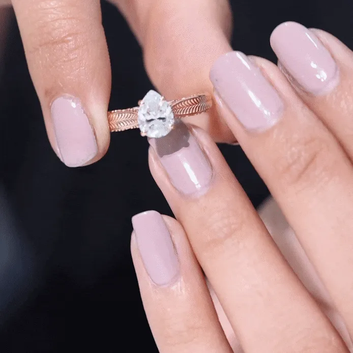 Claw Set Pear Shape Moissanite Solitaire Engagement Ring