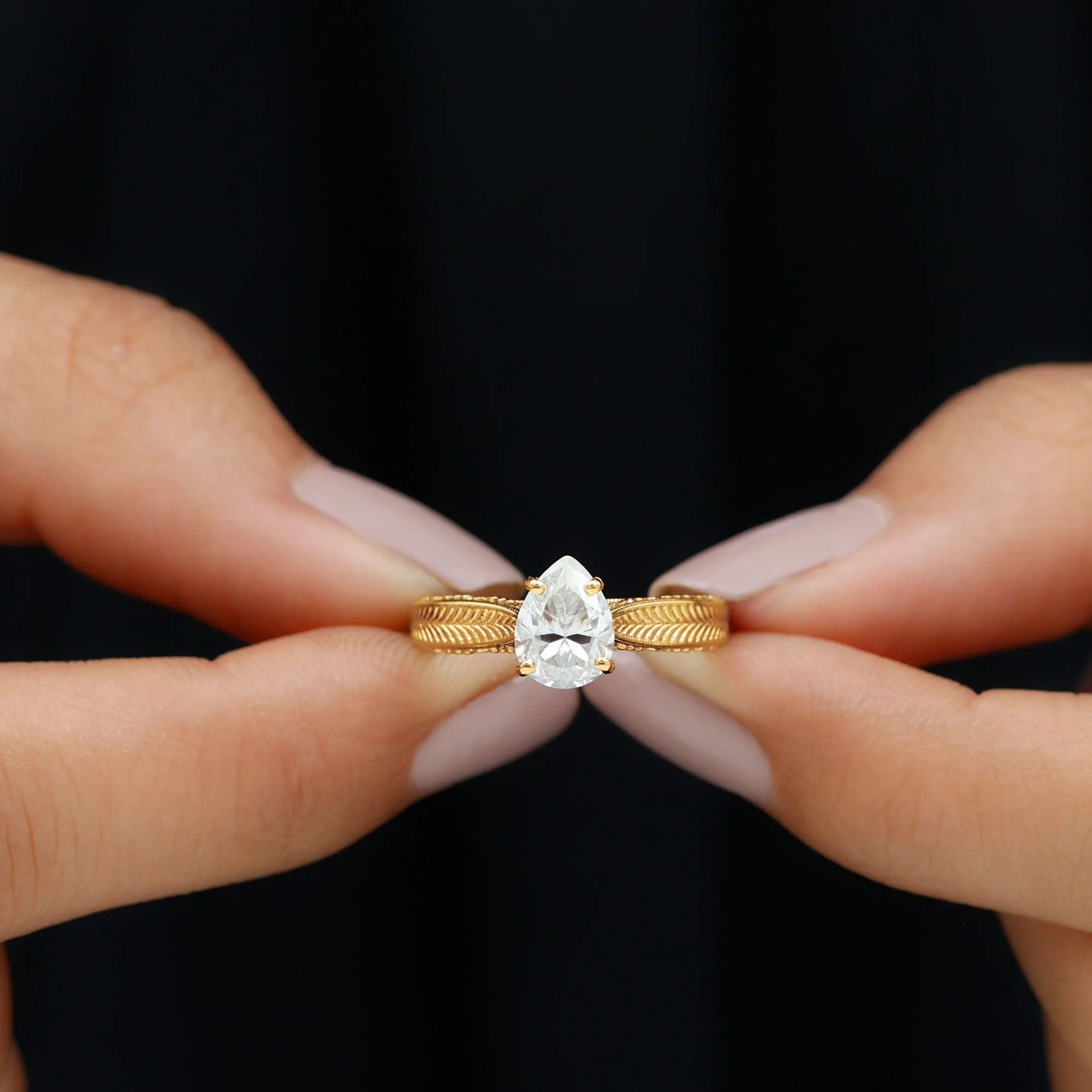 Claw Set Pear Shape Moissanite Solitaire Engagement Ring