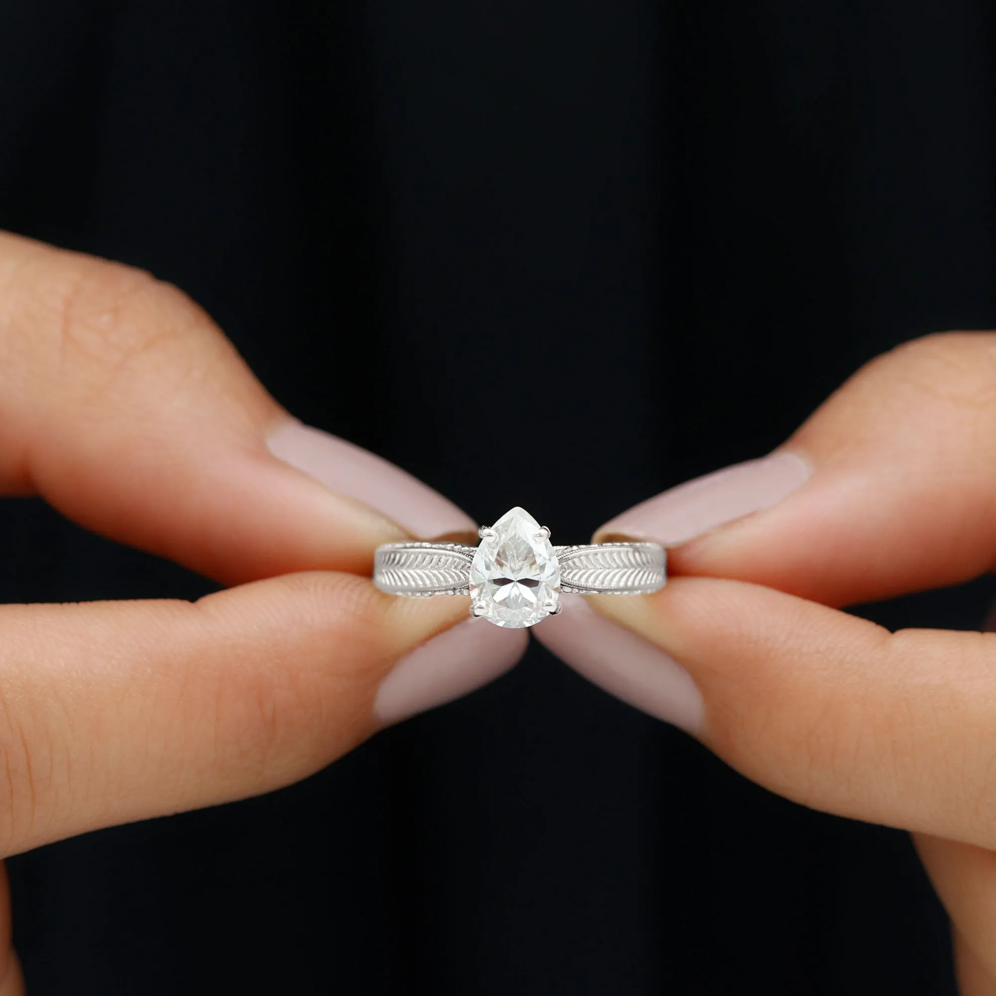 Claw Set Pear Shape Moissanite Solitaire Engagement Ring