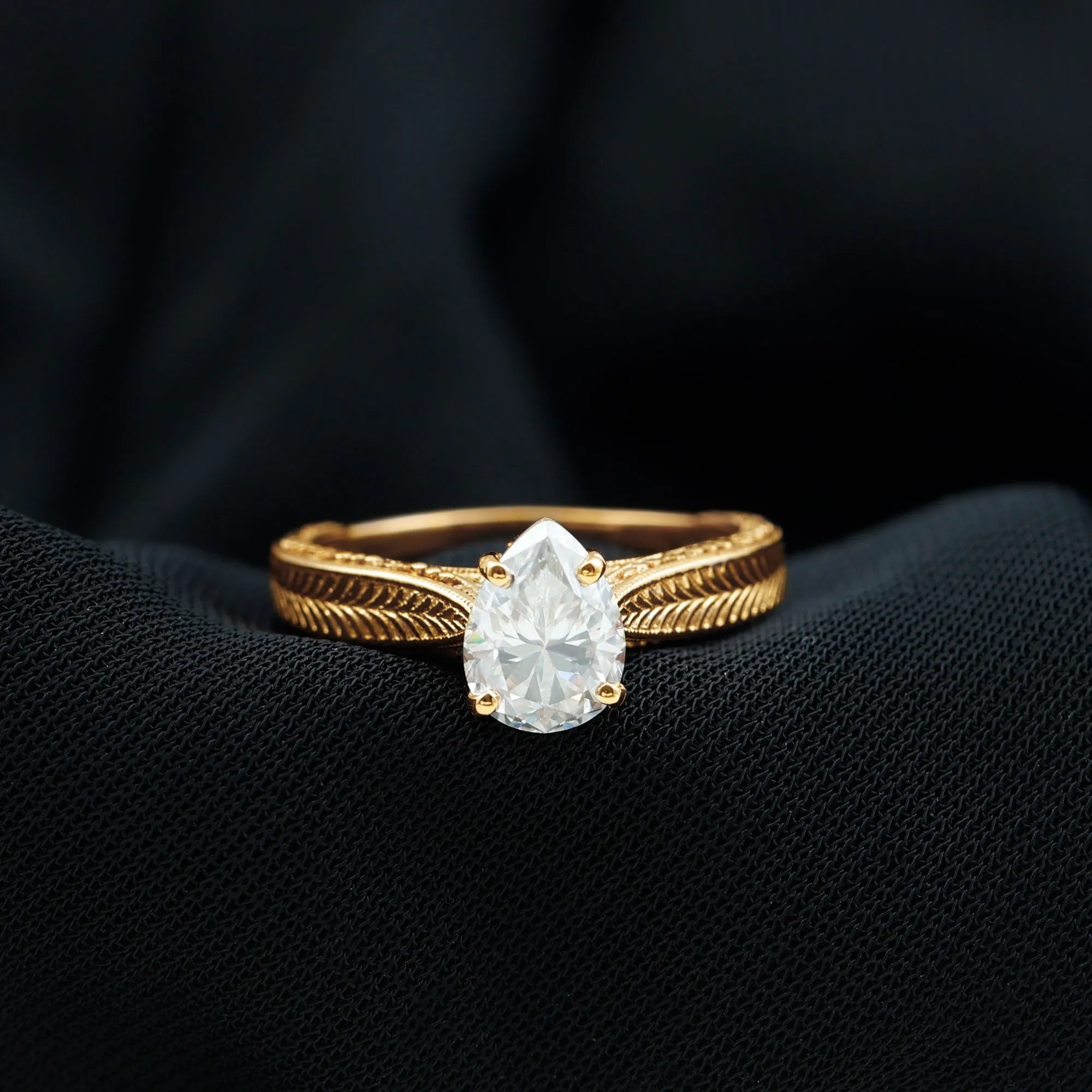 Claw Set Pear Shape Moissanite Solitaire Engagement Ring
