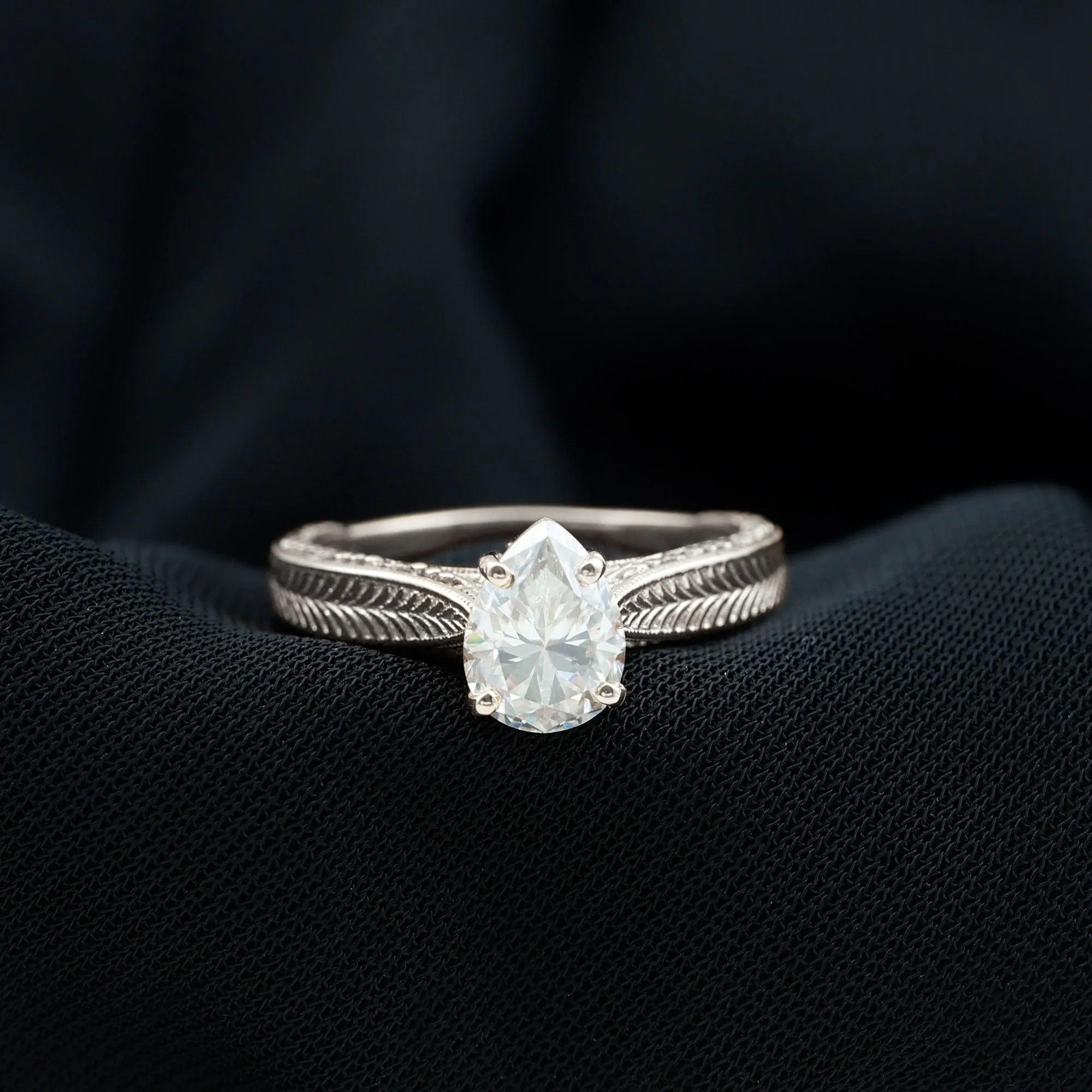Claw Set Pear Shape Moissanite Solitaire Engagement Ring