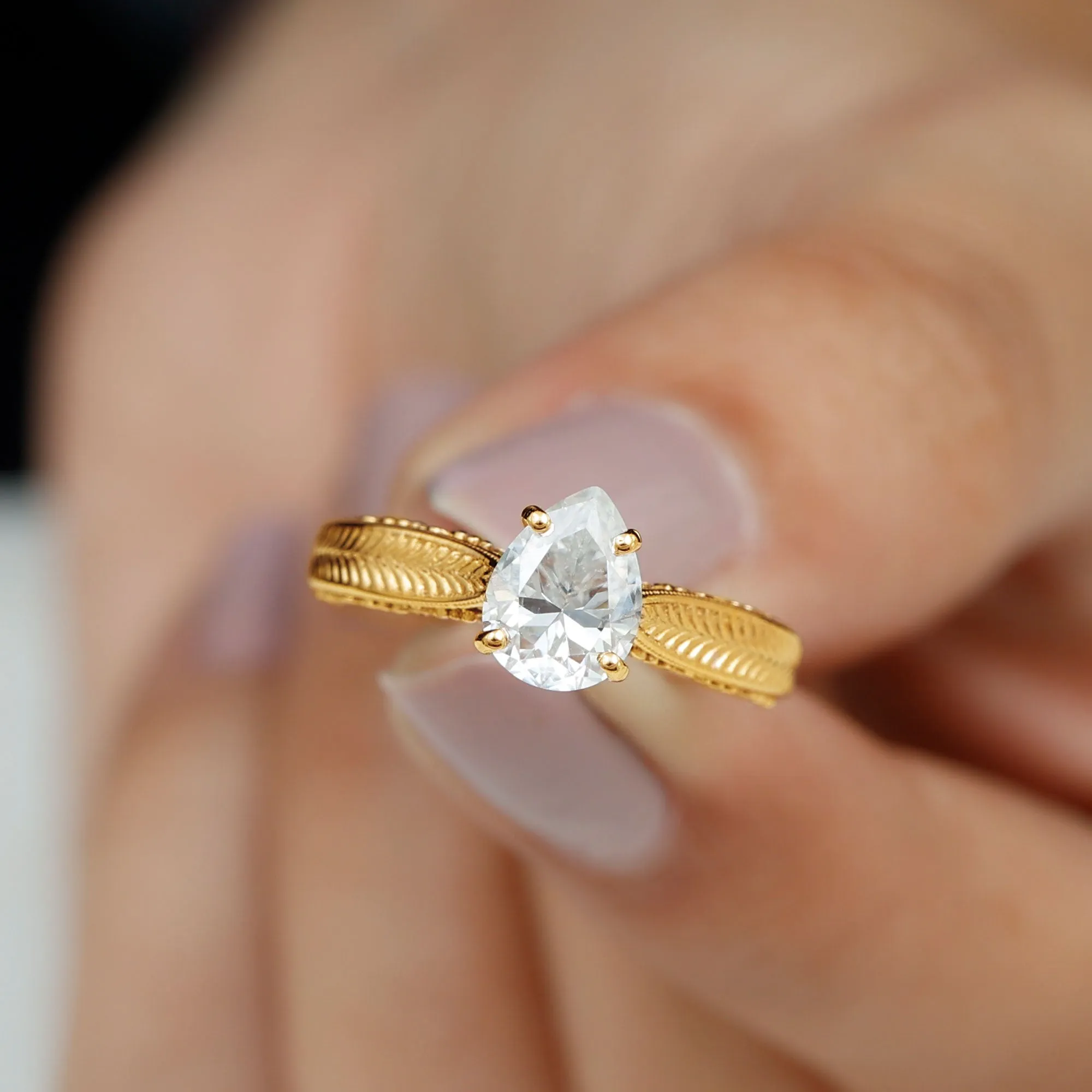 Claw Set Pear Shape Moissanite Solitaire Engagement Ring
