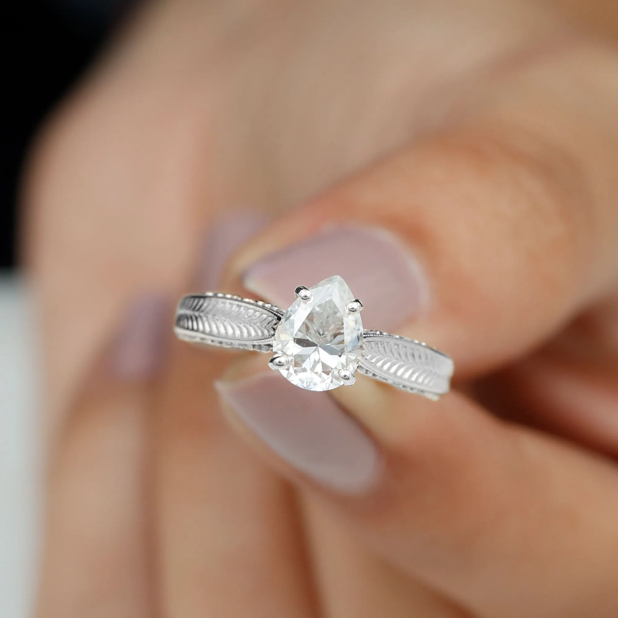Claw Set Pear Shape Moissanite Solitaire Engagement Ring