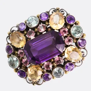 Emerald ring Dorrie Nossiter garnet brooch Assher diamond ring
