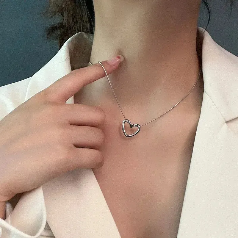 LOVCIA Clavicle Chain Elegant Titanium Steel Hollow Heart Pendant Necklace for Women