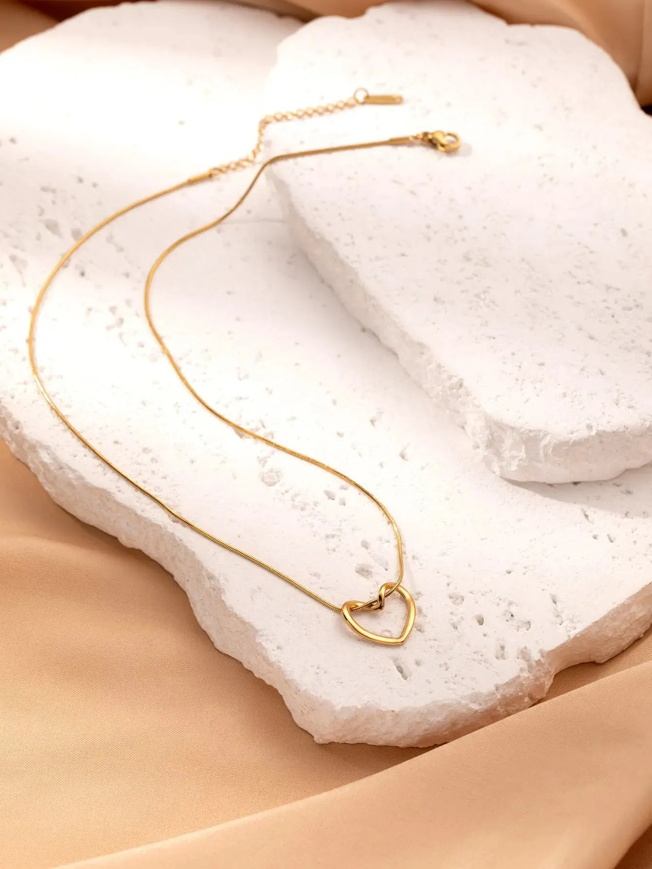 LOVCIA Clavicle Chain Elegant Titanium Steel Hollow Heart Pendant Necklace for Women