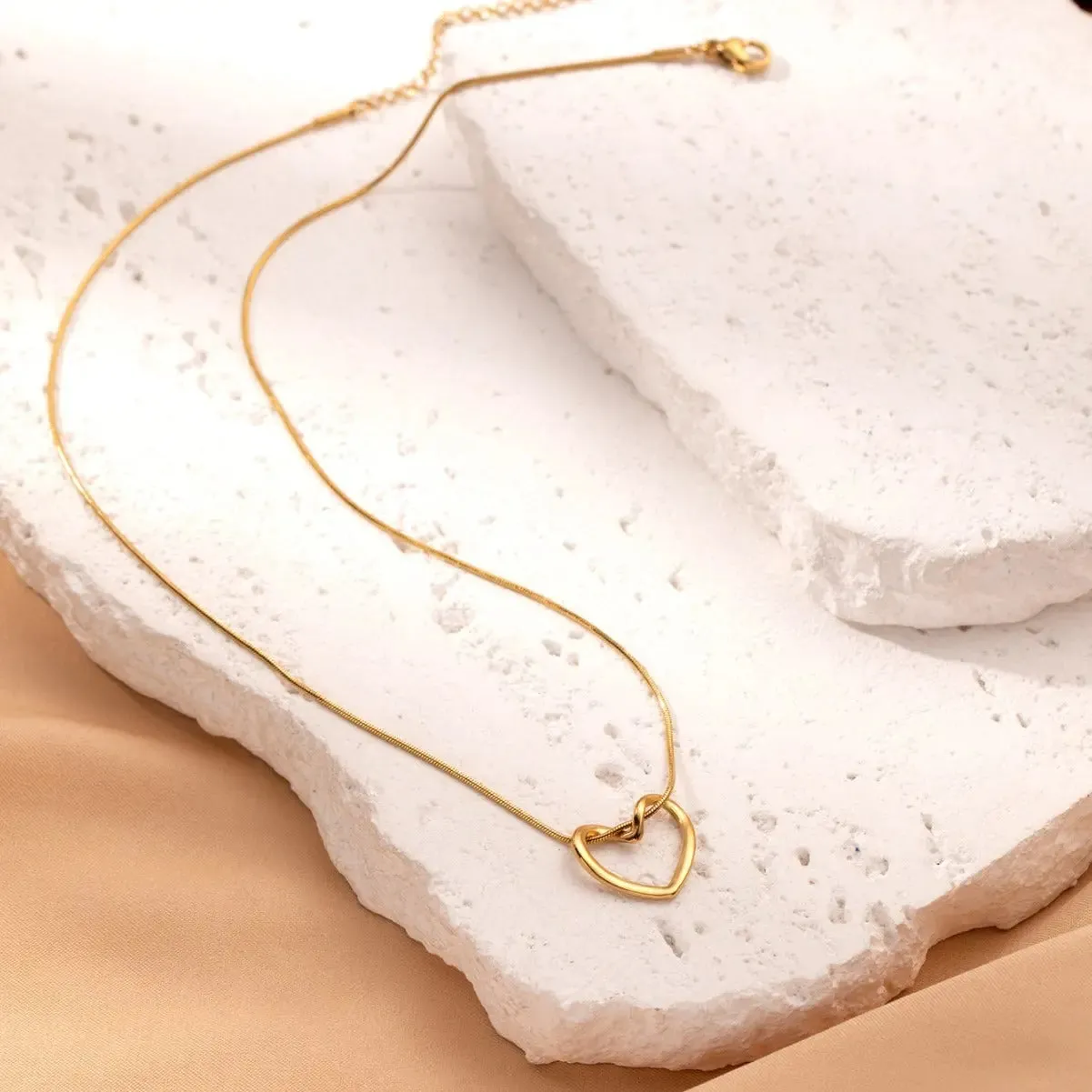 LOVCIA Clavicle Chain Elegant Titanium Steel Hollow Heart Pendant Necklace for Women