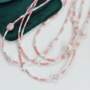Peachy pearl necklaces