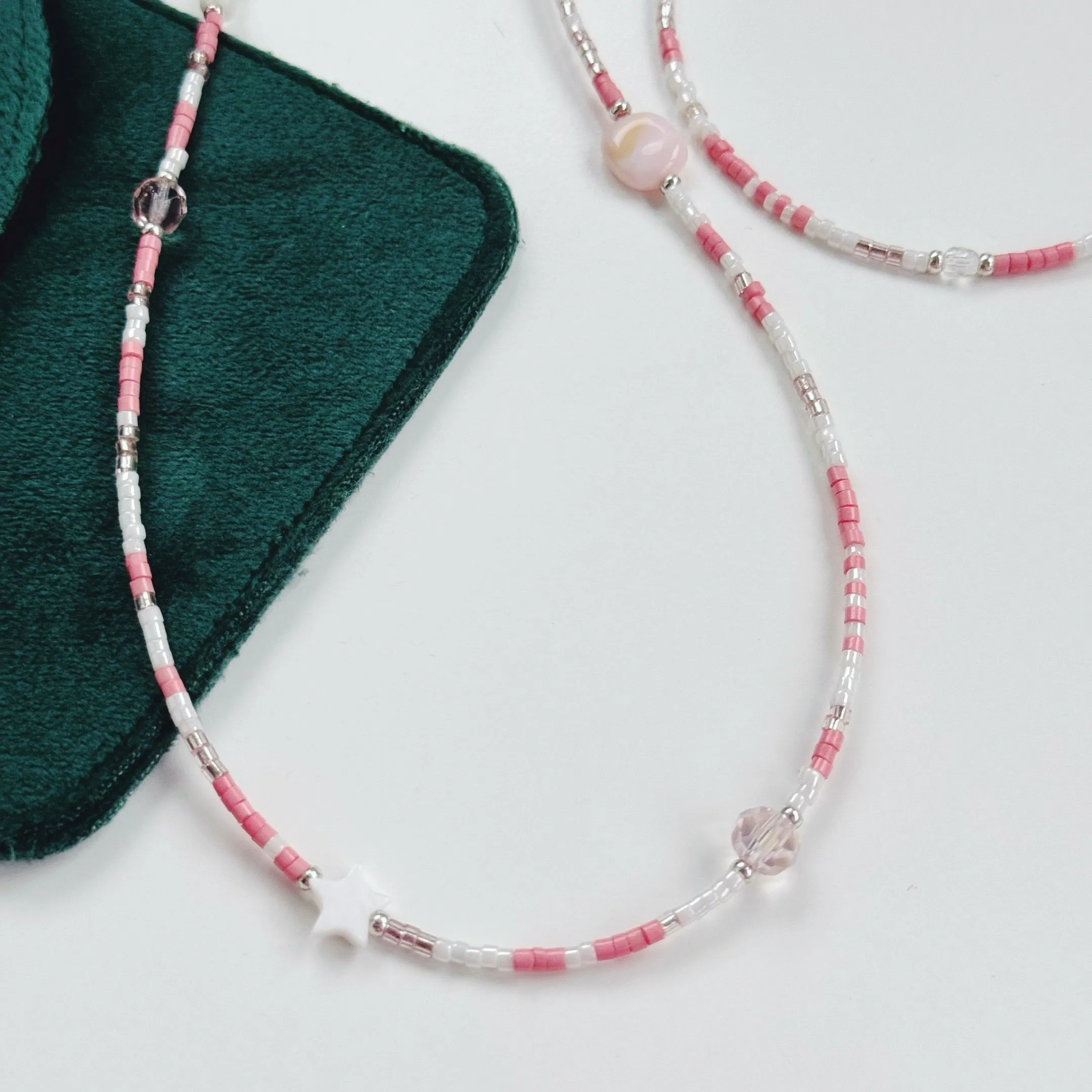 Peachy pearl necklaces