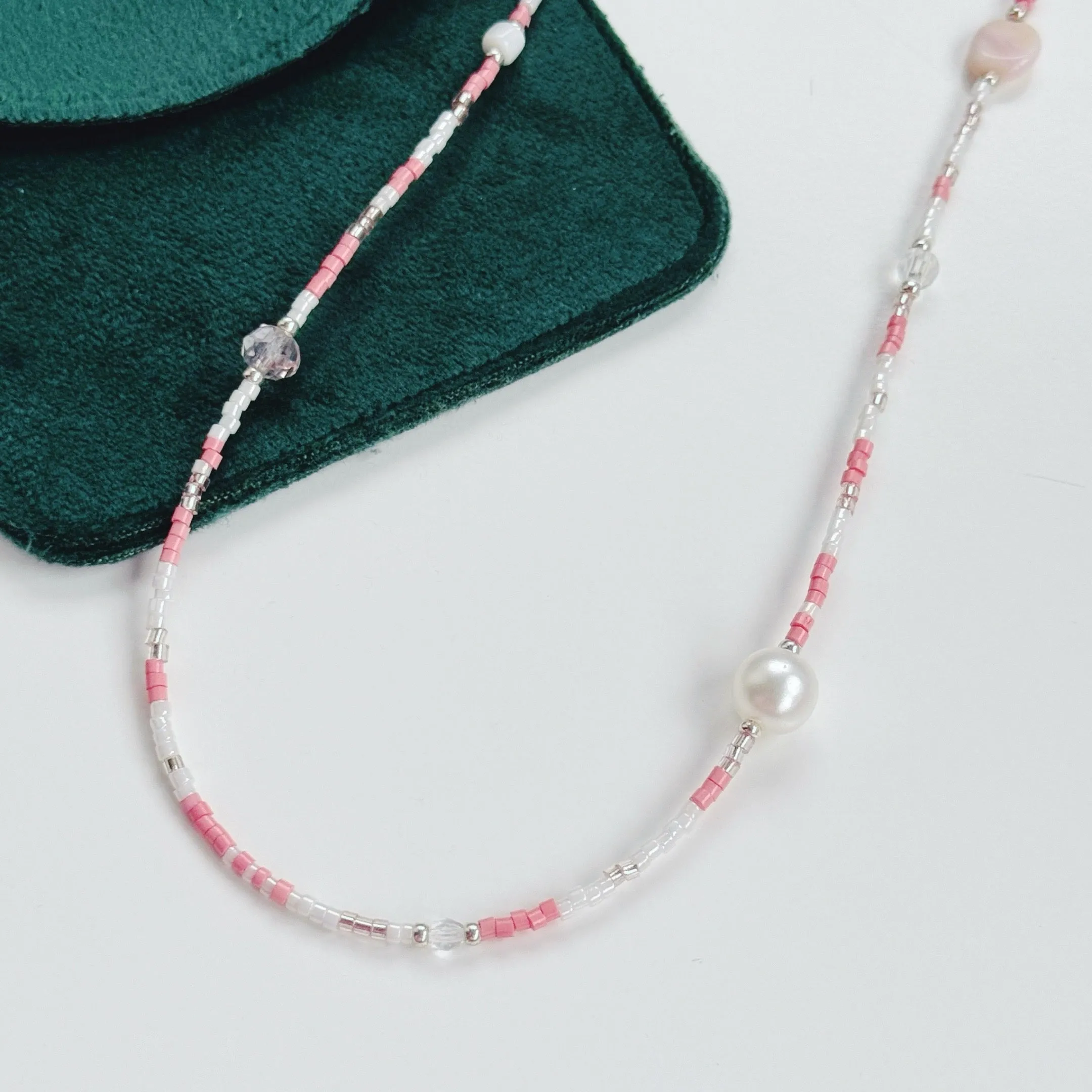 Peachy pearl necklaces