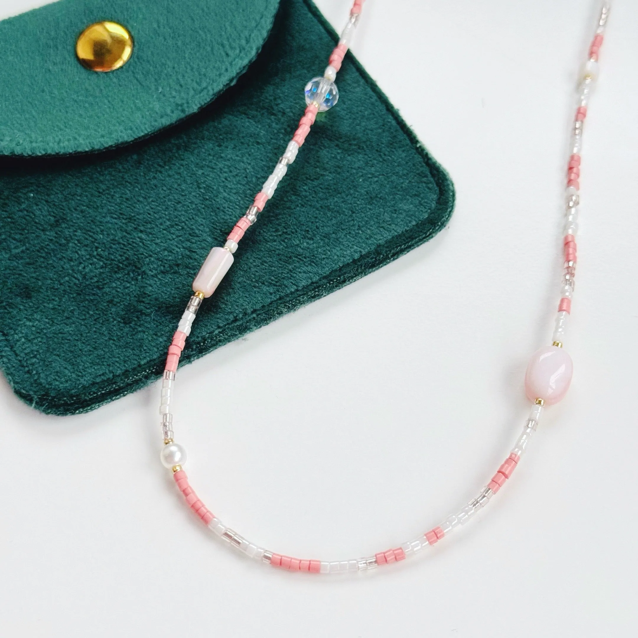 Peachy pearl necklaces