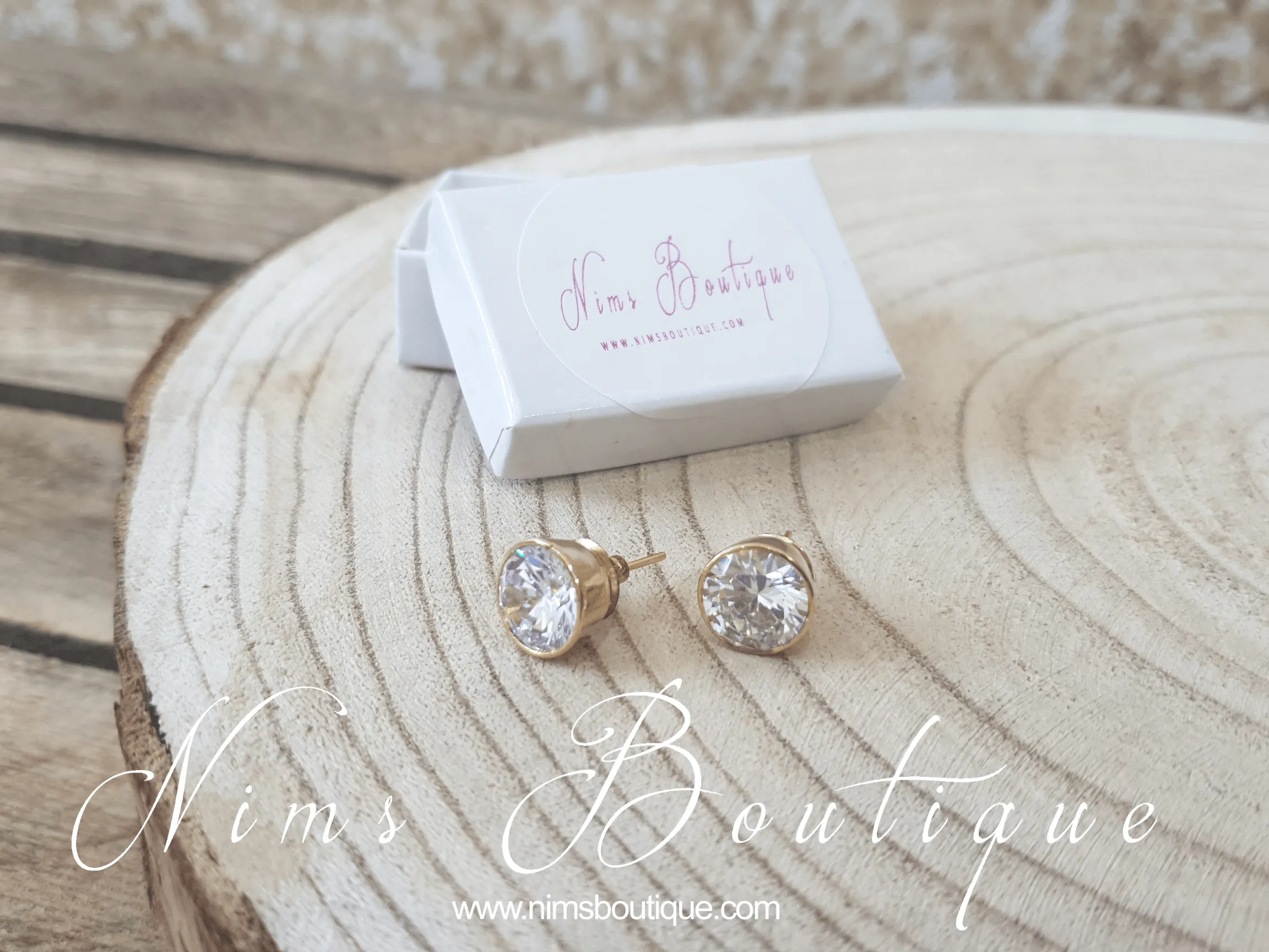 The NB Clear stud earrings