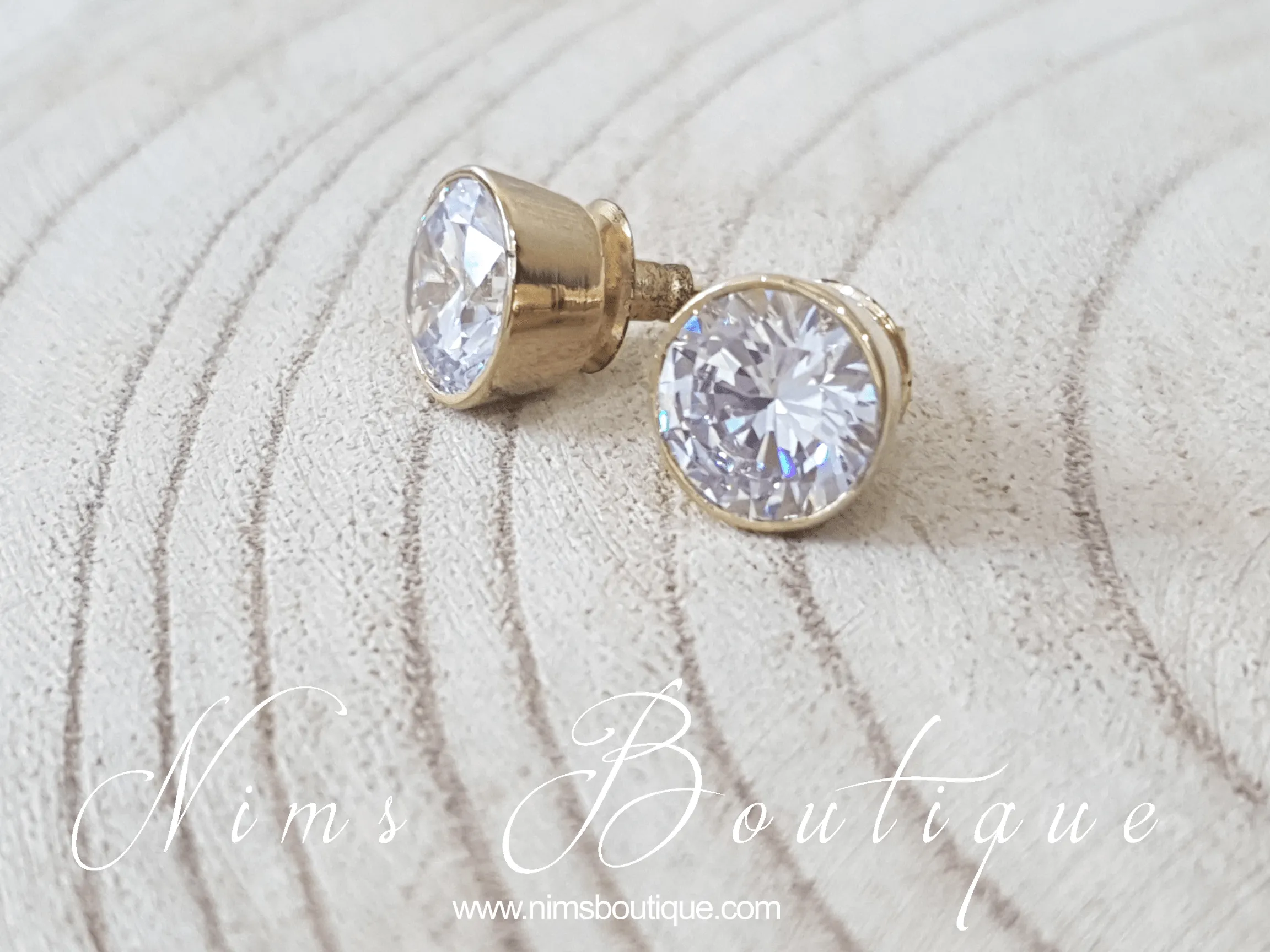 The NB Clear stud earrings