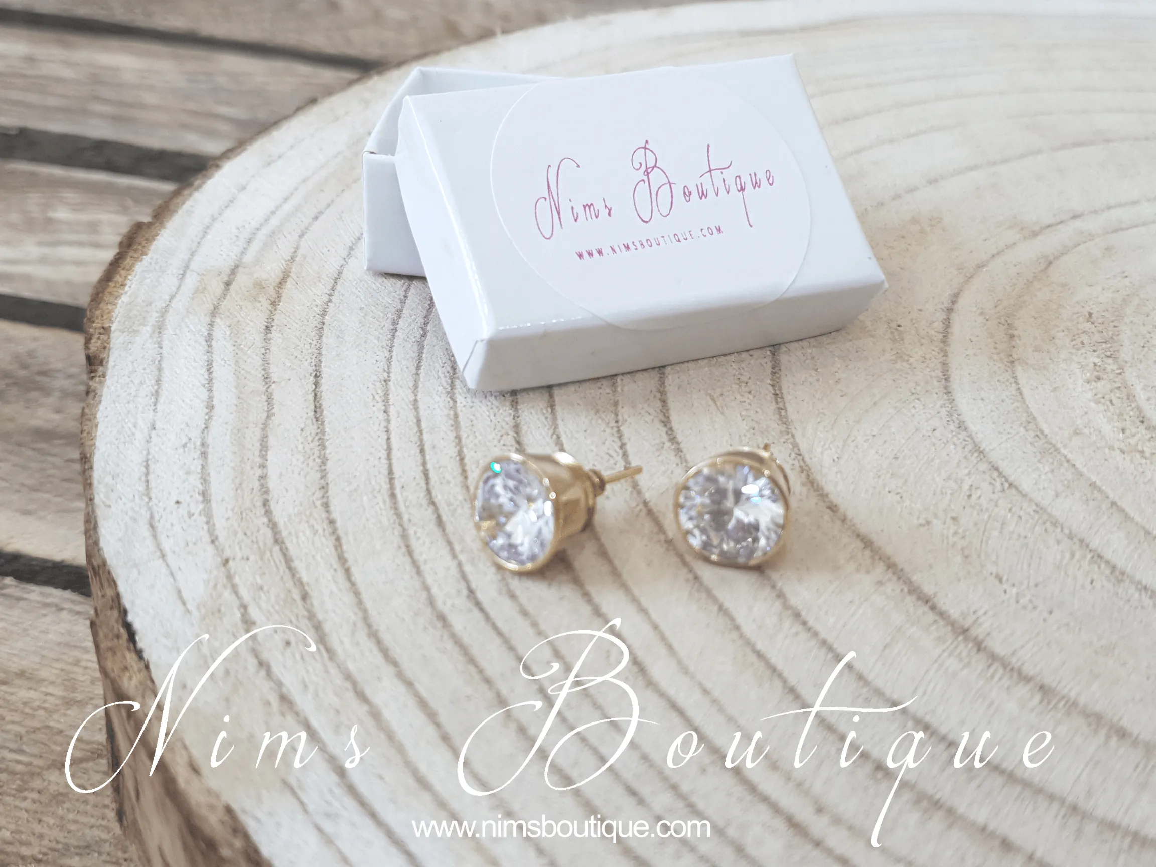 The NB Clear stud earrings