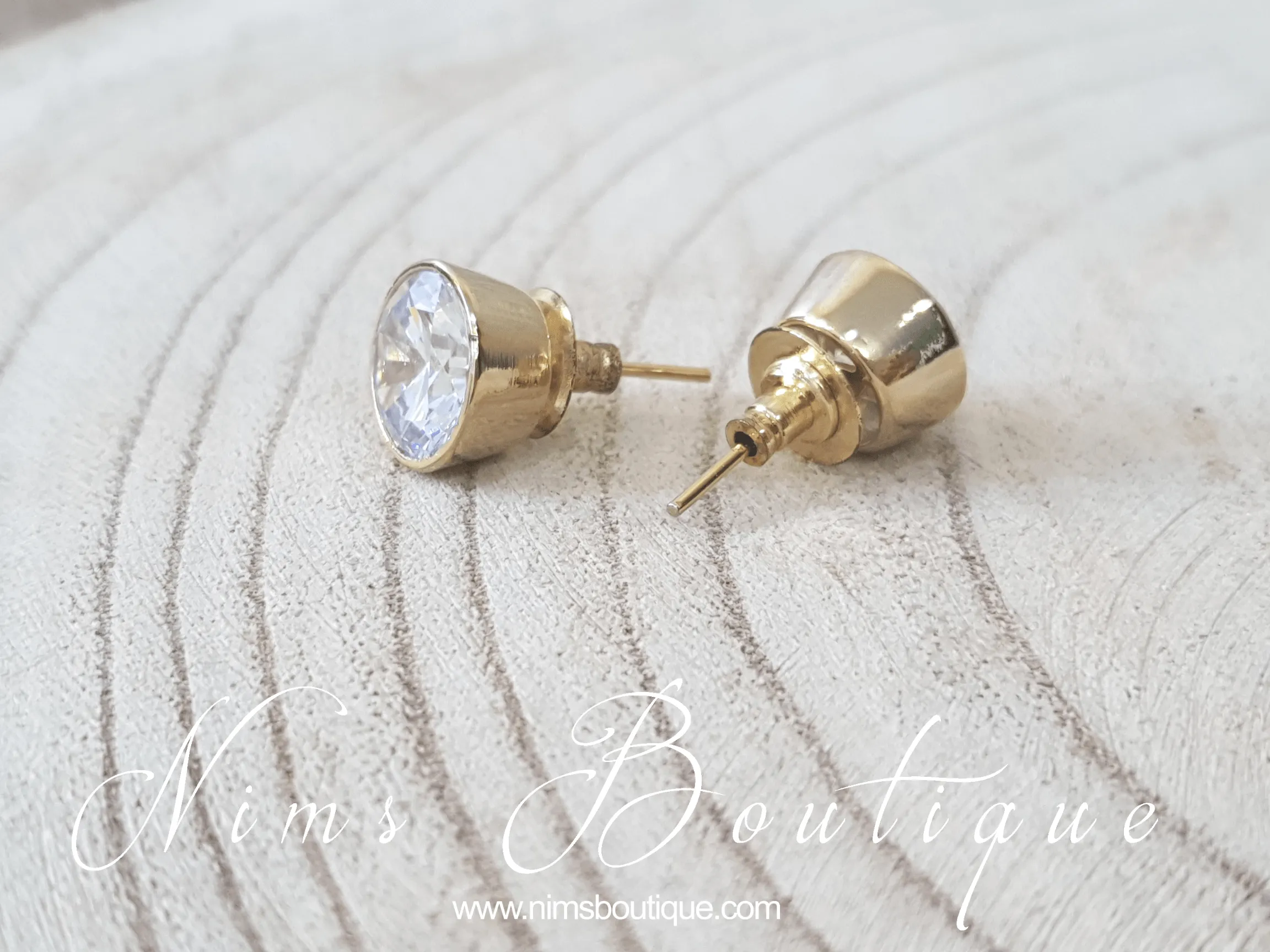 The NB Clear stud earrings