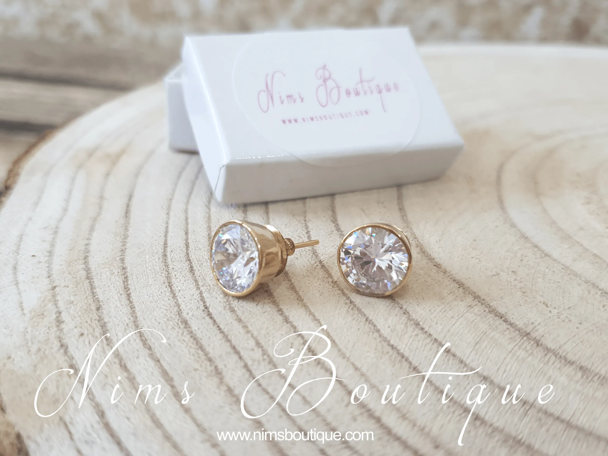 The NB Clear stud earrings